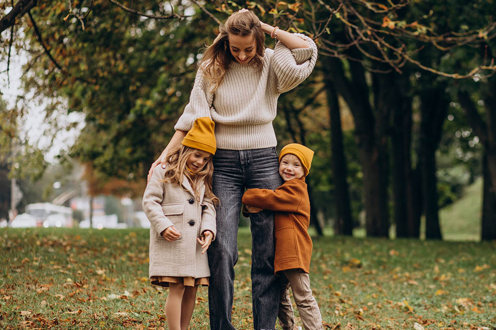 A woman with her 2 kids